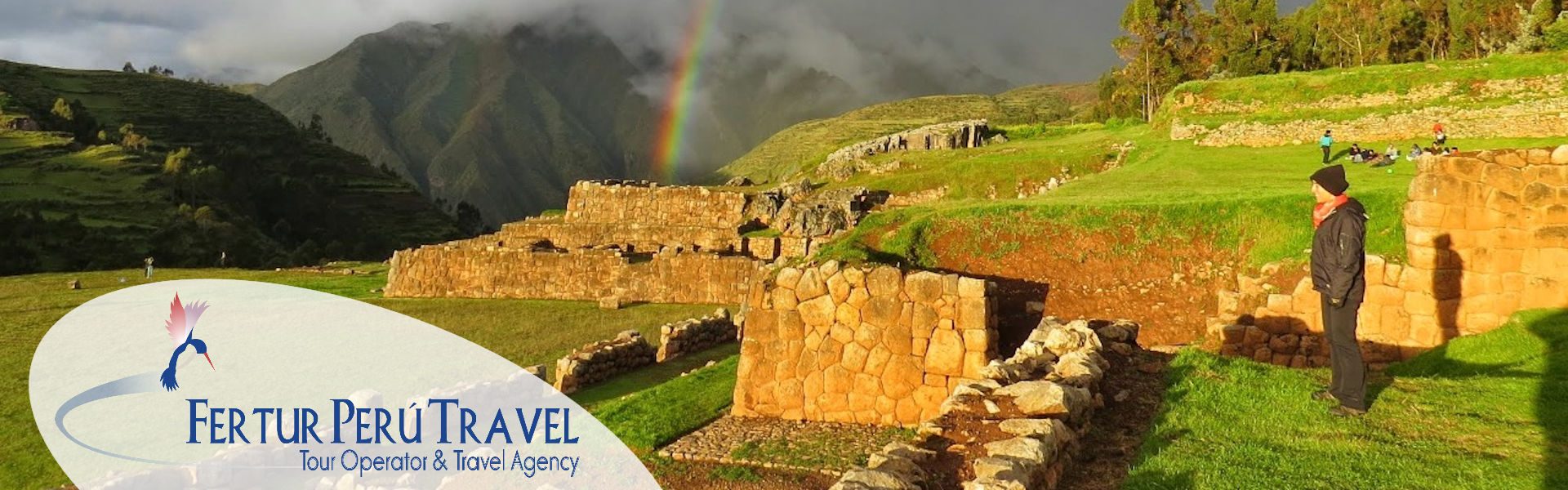 Fertur Peru Travel client looks at rainbow at Chincheros, Cusco, Peru